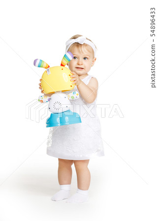 beautiful little girl all in white clothes beautiful little girl all in white clothes 54896433