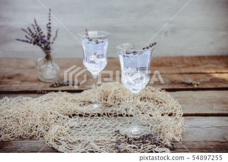 Fresh lavender lemonade with flowers and ice cubes 54897255
