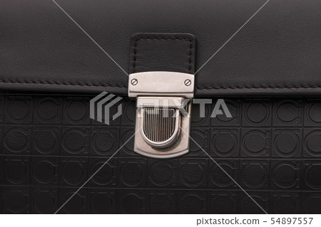 the clasp on the black bag the clasp on the black bag 54897557