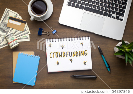 Make your crowdfunding with laptop and credit card from office 54897846