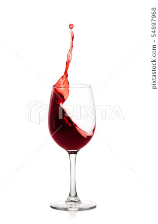splash of red wine in glass 54897968