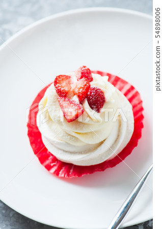 One beautiful pavlova dessert in a plate. One beautiful pavlova dessert in a plate. 54898006
