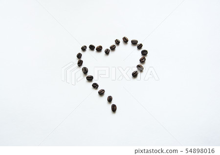 Heart shape from coffe beans. Top view. 54898016