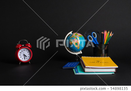school supplies on black background school supplies on black background 54898135