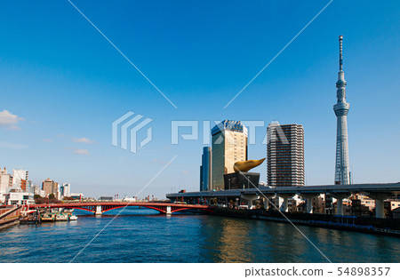 Asahi Beer Hall Tower against blue sky, Japan Asahi Beer Hall Tower against blue sky, Japan 54898357