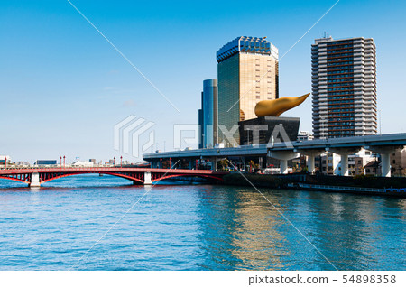 Asahi Beer Hall Tower against blue sky, Japan 54898358