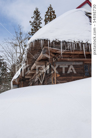 Old houses buried in the snow Old houses buried in the snow 54898730