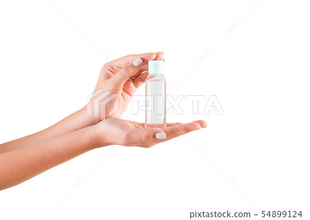 Female hand holding cream bottle of lotion Female hand holding cream bottle of lotion 54899124