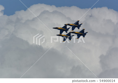 Formation of the US Navy's FA-18 fighter attack aircraft flying in the sky 54900014