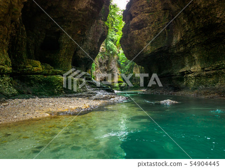 Martvili canyon in Georgia. Beautiful natural canyon with view of the mountain river, christal blue Martvili canyon in Georgia. Beautiful natural canyon with view of the mountain river, christal blue 54904445