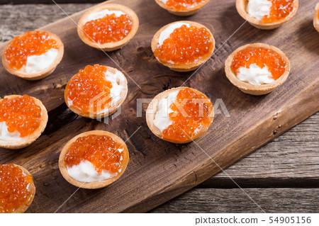Tartalets with red caviar 54905156