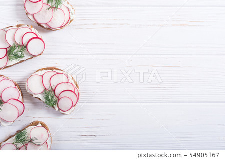 Healthy vegetable toasts sandwith with radish and Healthy vegetable toasts sandwith with radish and 54905167