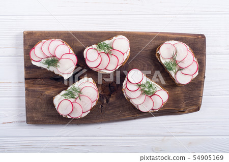 Healthy vegetable toasts sandwith with radish and Healthy vegetable toasts sandwith with radish and 54905169