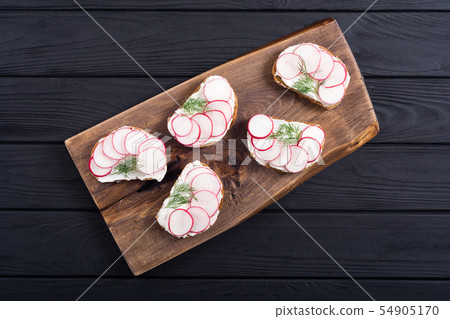 Healthy vegetable toasts sandwith with radish and Healthy vegetable toasts sandwith with radish and 54905170