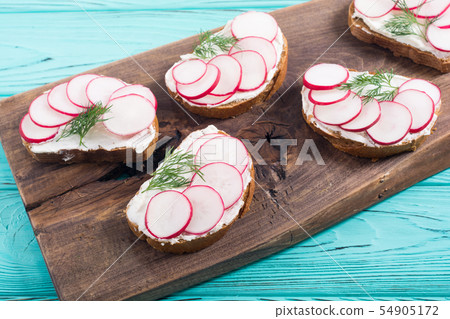 Healthy vegetable toasts sandwith with radish and Healthy vegetable toasts sandwith with radish and 54905172