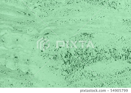 Closeup of mint colored porous stone textured wall 54905799