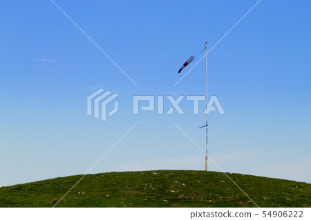 Isolated windsock on blue sky, sport background 54906222