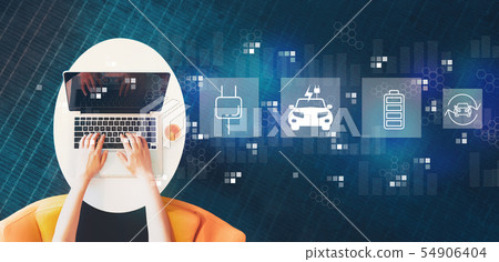 EV with person using a laptop 54906404