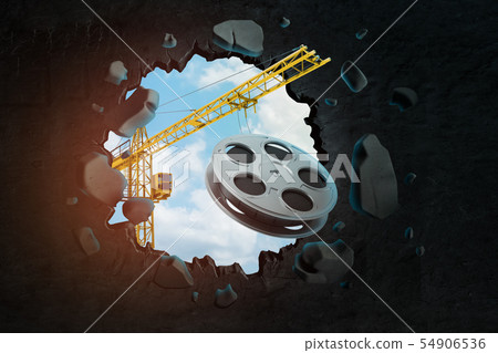 3d rendering of hoisting crane carrying film reel and breaking black wall leaving hole in it with 3d rendering of hoisting crane carrying film reel and breaking black wall leaving hole in it with 54906536