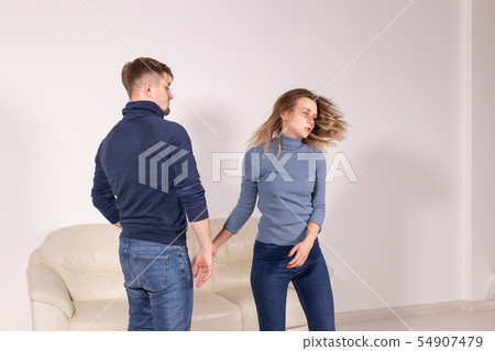 People and abuse concept - Aggressive man beats woman, domestic violence People and abuse concept - Aggressive man beats woman, domestic violence 54907479