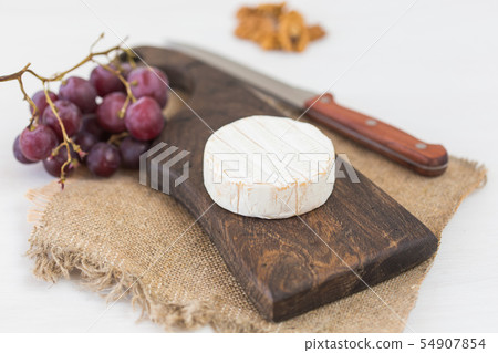 Blue cheese or brie with grapes and nuts Blue cheese or brie with grapes and nuts 54907854