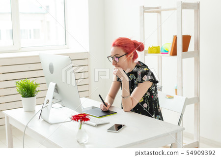 Graphic designer, people concept - Young designer female hipster with graphic tablet working in Graphic designer, people concept - Young designer female hipster with graphic tablet working in 54909392
