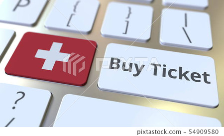 BUY TICKET text and flag of Switzerland on the buttons on the computer keyboard. Travel related 54909580