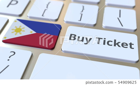 BUY TICKET text and flag of Philippines on the buttons on the computer keyboard. Travel related BUY TICKET text and flag of Philippines on the buttons on the computer keyboard. Travel related 54909625