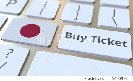 BUY TICKET text and flag of Japan on the buttons on the computer keyboard. Travel related conceptual BUY TICKET text and flag of Japan on the buttons on the computer keyboard. Travel related conceptual 54909731