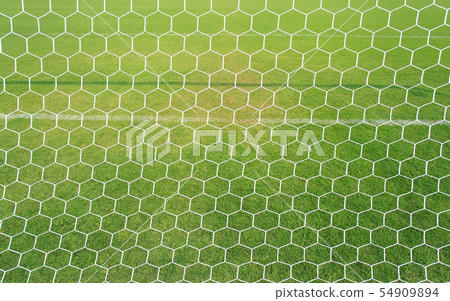 football net with green grass background. football net with green grass background. 54909894