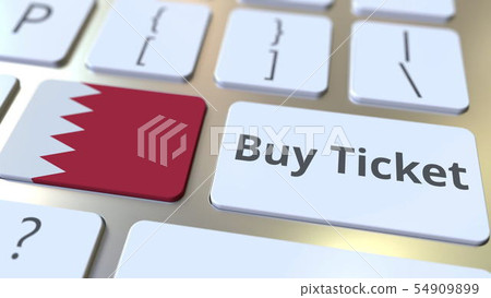 BUY TICKET text and flag of Bahrain on the buttons on the computer keyboard. Travel related 54909899