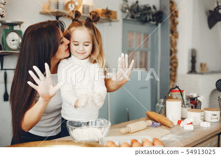Family cook the dough for cookies 54913025
