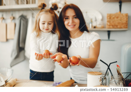Family cook the dough for cookies Family cook the dough for cookies 54913289