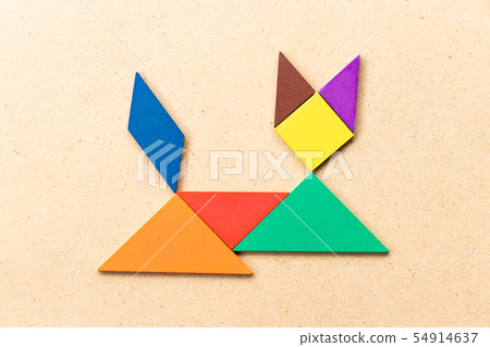 Color tangram puzzle in lying down cat shape Color tangram puzzle in lying down cat shape 54914637