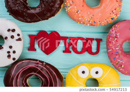 Romantic composition with assorted donuts. Romantic composition with assorted donuts. 54917213