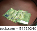 gold in  thai temple make for Buddha statue 54919240