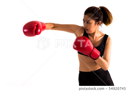 Portrait of a young female boxer punching on white isolated background with copy space 54920745