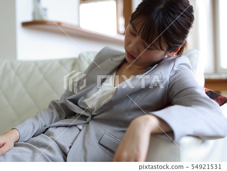 Image of a tired business woman Image of a tired business woman 54921531
