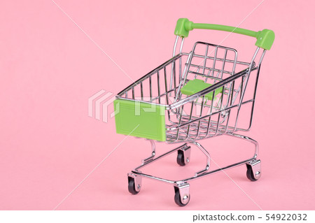 Empty shopping cart on a pink background Empty shopping cart on a pink background 54922032