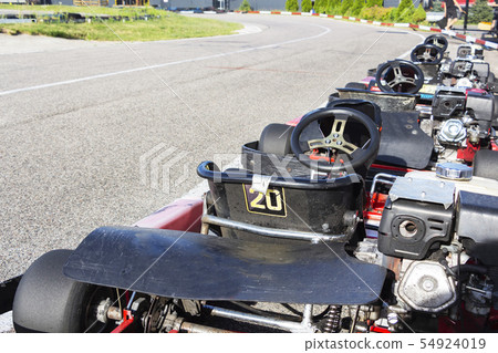 A number of small race cars ready for the race. A number of small race cars ready for the race. 54924019