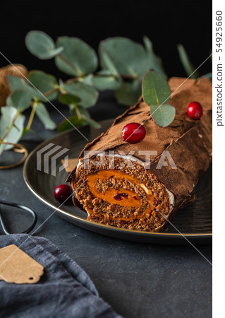 Buche de Noel. Traditional Christmas dessert, Christmas yule log cake with chocolate cream 54925660