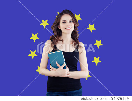 Happy woman student with book  54926129