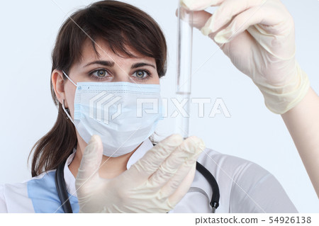 Medical researcher or doctor with clear solution Medical researcher or doctor with clear solution 54926138