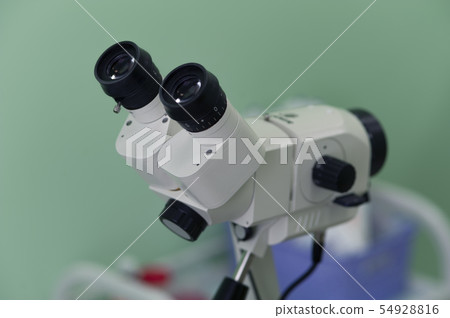 Close up magnifying glass microscope 54928816