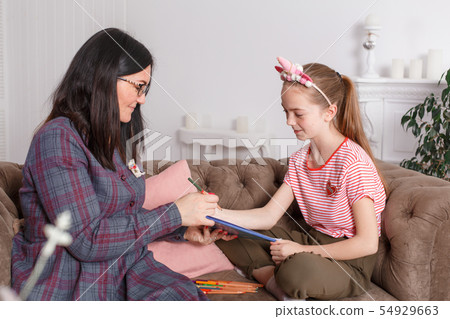 Teen girl on reception at the psychotherapist. 54929663