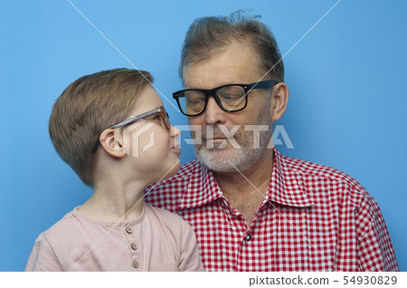 Close-up of a positive grandfather and grandson Close-up of a positive grandfather and grandson 54930829