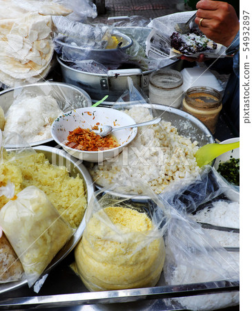 Vietnamese street food cheap sticky corn Vietnamese street food cheap sticky corn 54932897