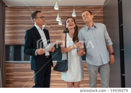 Wife feeling amazing while buying new apartment with husband 54936879