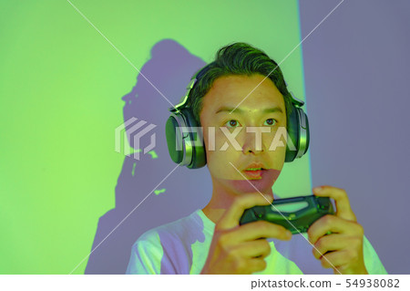 [Image of e-Sport] A picture of a gameplay scene that is held in the hands of a professional gamer with a lively feeling 54938082