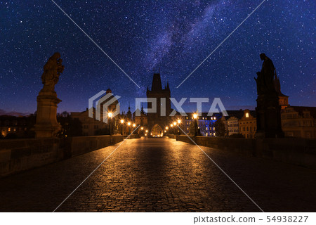 Prague, Charles bridge at night with starry sky 54938227